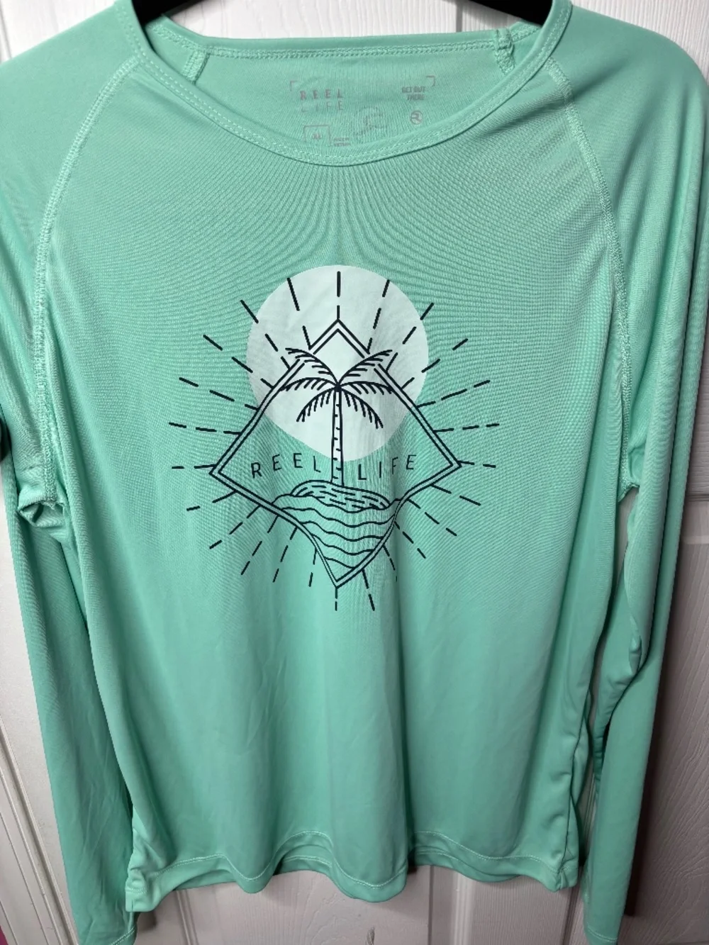Reel life rash guard